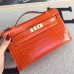 Replica Handbag Store Orange Kelly Pochette Shiny Niloticus Crocodile Bag