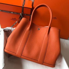 Replica Handbag Store Garden Party 36 Bag In Orange Clemence Leather