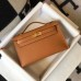 Replica Handbag Store Kelly Pochette Bag In Gold Epsom Leather Replica Handbag Store Kelly Pochette Bag In Gold Epsom Leather